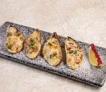 Мидии под соусом дорблю