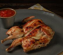 Перепелка с булгуром, вешенками и сливочно-трюфельным соусом