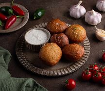 Лукуматики с соусом дзадзыки