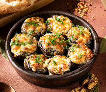 Запеченные шампиньоны с сыром сулугуни