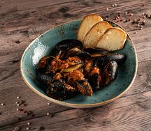 Мидии в томатном соусе