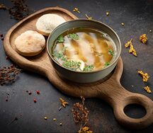 Куриный бульон с яйцом и курицей