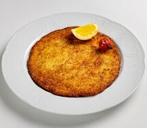 Шницель из индейки по-милански