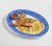 Целиковый цыпленок с картофельным татеном