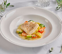 Палтус с тушеными овощами