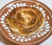 Запеченная плацында с капустой