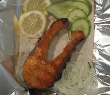 Форель морская, запечённая на мангале