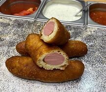 Сосиска в тесте жареная