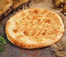 Лепёшка из печи с кунжутом