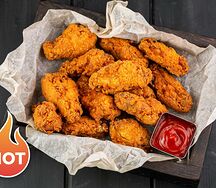 Жгучие куриные крылышки фри