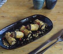 Рулетики из баклажанов с начинкой из орехов и томатов