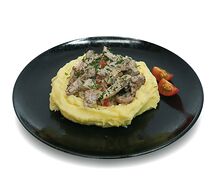 Свинина с овощами на картофельной подушке