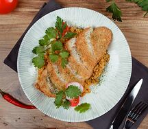 Куриный шницель с булгуром и томатами