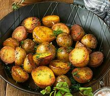 Мини-картофель, запеченный с травами