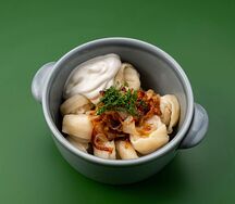 Пельмени из муксуна с жареным луком