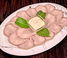 Язык отварной с хреном