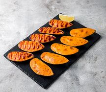 Ассорти мидий, запеченных в ракушках