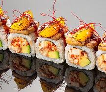 Ролл с фуа-гра, угрем и обожженным апельсином