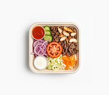 Шаурма на тарелке Курица и говядина 
