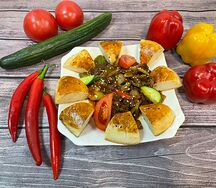Мясо с овощами в остром соусе