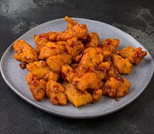 Рыба жаренная в остром соевом соусе