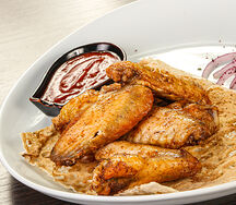 Куриные крылышки на углях