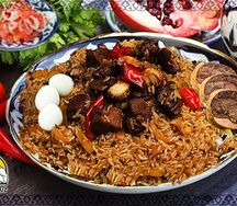 Чайханский плов с кази и перепелиной яйцом