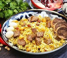 Плов Ташкентский с казы и перепелиной яйцом