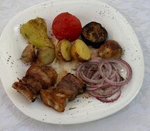Свиные ребра с овощами 