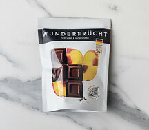 Конфеты Wunderfrucht персик в темном шоколаде
