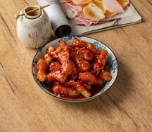 Свинина хрустящая в кисло-сладком соусе