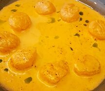 Морской гребешок в чесночном масле