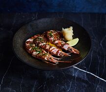 Лангустины с гранатовым унаги-соусом