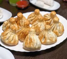Хинкали жареные с говядиной и свининой