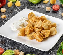 Пельмени жареные