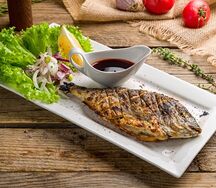 Дорада на мангале