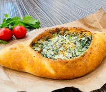 Хачапури по-аджарски со шпинатом и сыром
