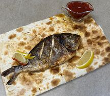 Дорадо на мангале