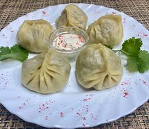 Манты с говядиной со сметаной