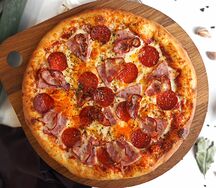 Пицца Мясное ассорти из дровяной печи