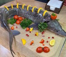 Осетрина целиковая на мангале