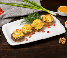 Грибы с начинкой из картофеля и сыра