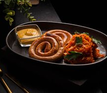 Колбаски курино-говяжьи с тушеной капустой