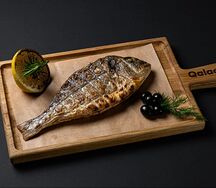 Дорадо, запеченная с прованскими травами