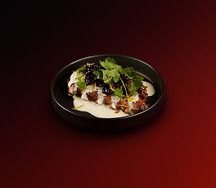 Рёбра свиные с древесными грибами и цитрусовым соусом