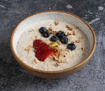 Каша с пюре из манго и бананом