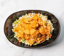 Курица в соусе Динамит с рисом и овощами