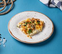 Запеченная куриная грудка с шампиньонами под сыром Гауда