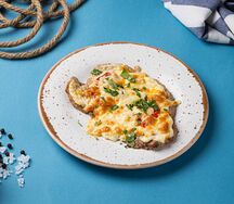 Свиная вырезка запеченная под сыром Гауда