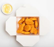 Куриные наггетсы с сырным соусом